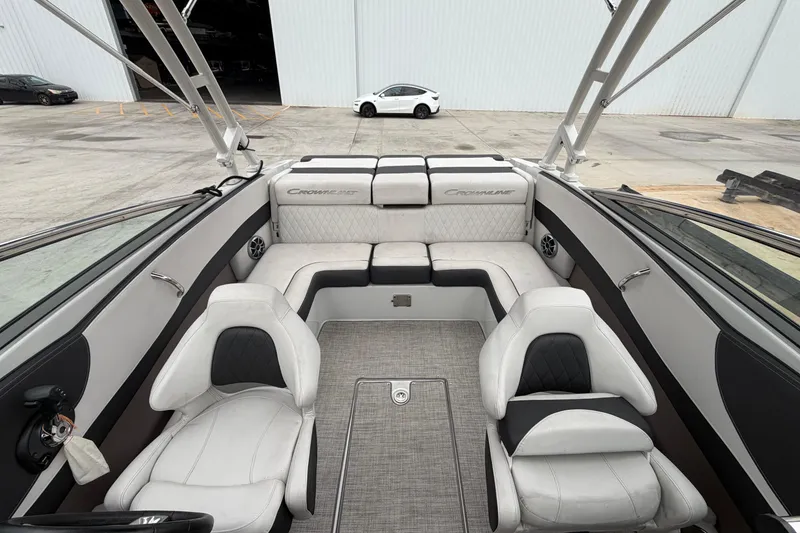 Slide: The Image of 2022 Crownline 240 SS boat interior with luxurious seating and modern design. - 9