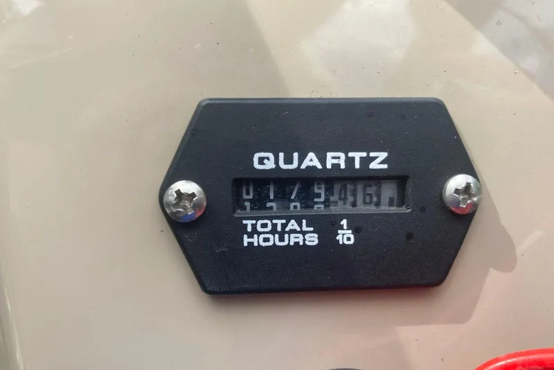 Slide: The Image of Hour meter on 2014 Sun Tracker Party Barge 18 DLX, displaying 179.4 hours. - 4