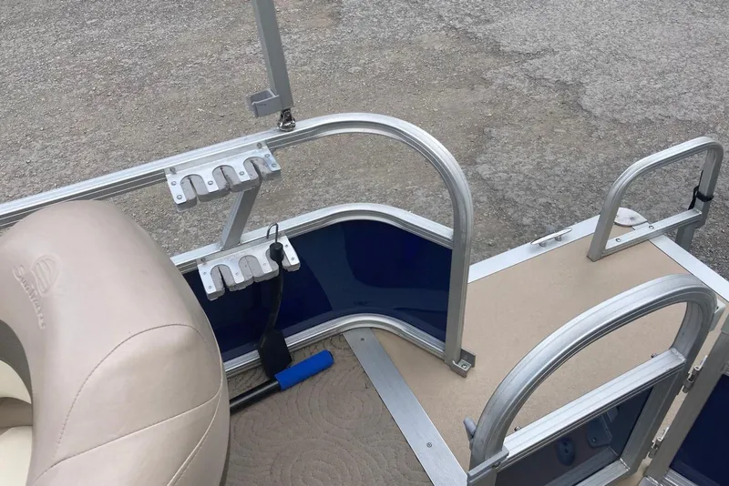 Slide: The Image of 2014 Sun Tracker Party Barge 18 DLX interior with seating and railing details. - 8