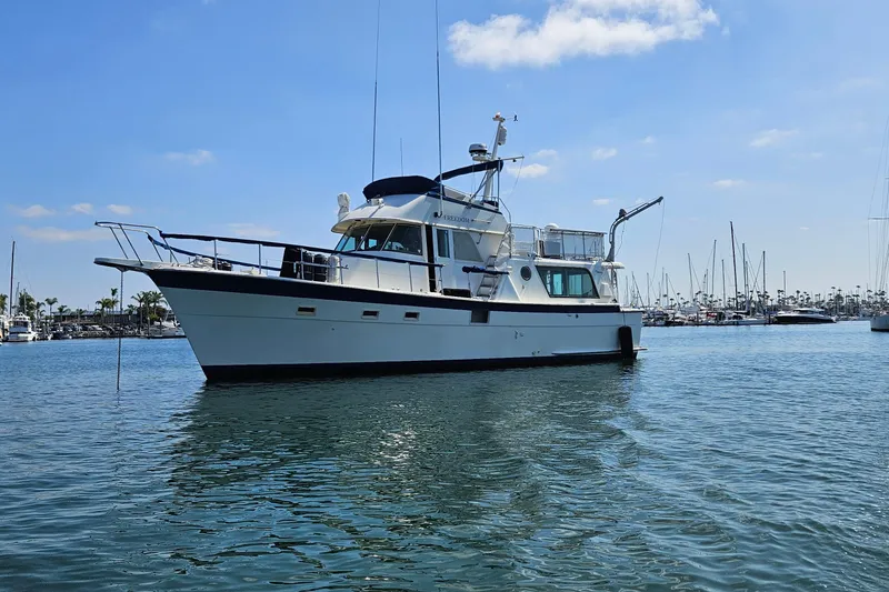 The Image of 1976 Hatteras 48 Long Range Cruiser in harbor. - 0