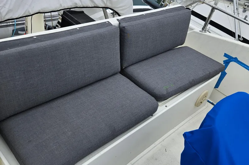 Slide: The Image of Engine room of a 1976 Hatteras 48 Long Range Cruiser with wiring and control panels. - 15