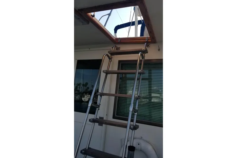 Slide: The Image of Engine room of 1976 Hatteras 48 Long Range Cruiser with fuel filter system. - 20