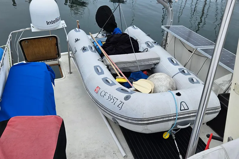 Slide: The Image of Engine room of 1976 Hatteras 48 Long Range Cruiser with equipment and tools. - 21