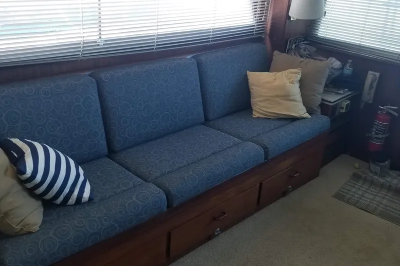 Slide: The Image of Open storage compartment on a 1976 Hatteras 48 Long Range Cruiser boat. - 37