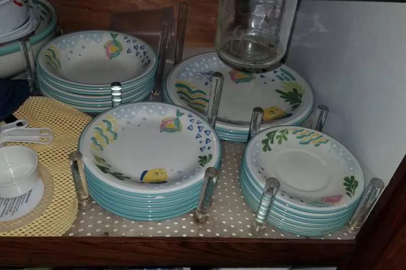 Slide: The Image of Interior staircase of 1976 Hatteras 48 Long Range Cruiser with wooden paneling and carpeted steps. - 49