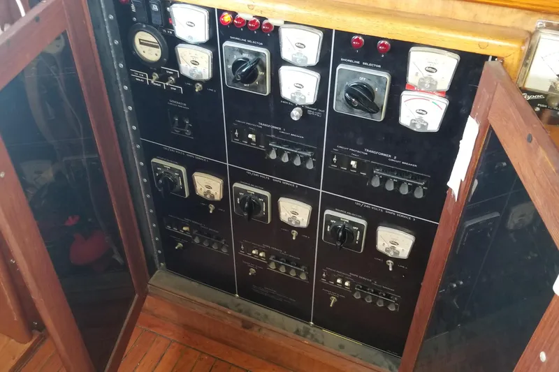 Slide: The Image of Victron Energy display showing alerts on a 1976 Hatteras 48 Long Range Cruiser. - 68