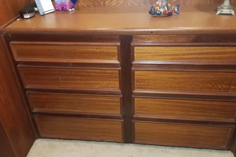 Slide: The Image of 1976 Hatteras 48 Long Range Cruiser undergoing maintenance on dry dock. - 77