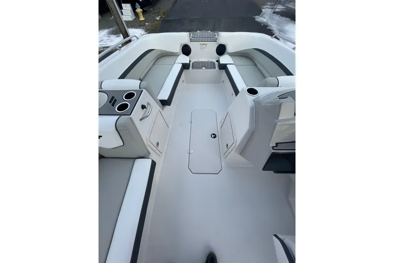 Slide: The Image of 2026 Starcraft SVX 191 OB boat interior with spacious seating and cup holders. - 12