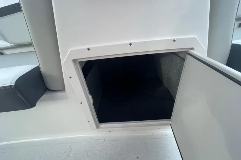 Slide: The Image of Open storage compartment on 2026 Starcraft SVX 191 OB boat interior. - 7
