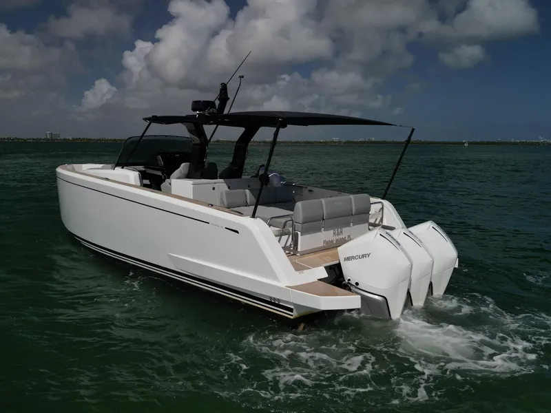 Slide: The Image of 2022 Pardo Yachts 38 cruising on open water under a cloudy sky. - 24