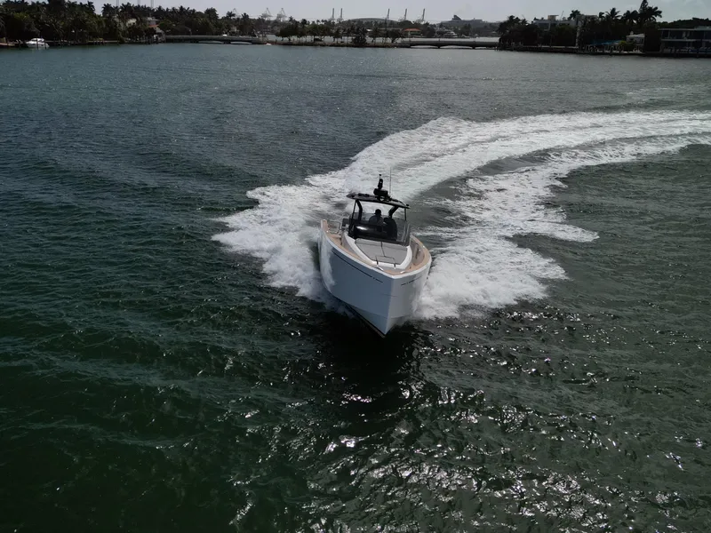 Slide: The Image of 2022 Pardo Yachts 38 cruising on open water, creating a dynamic wake. - 32