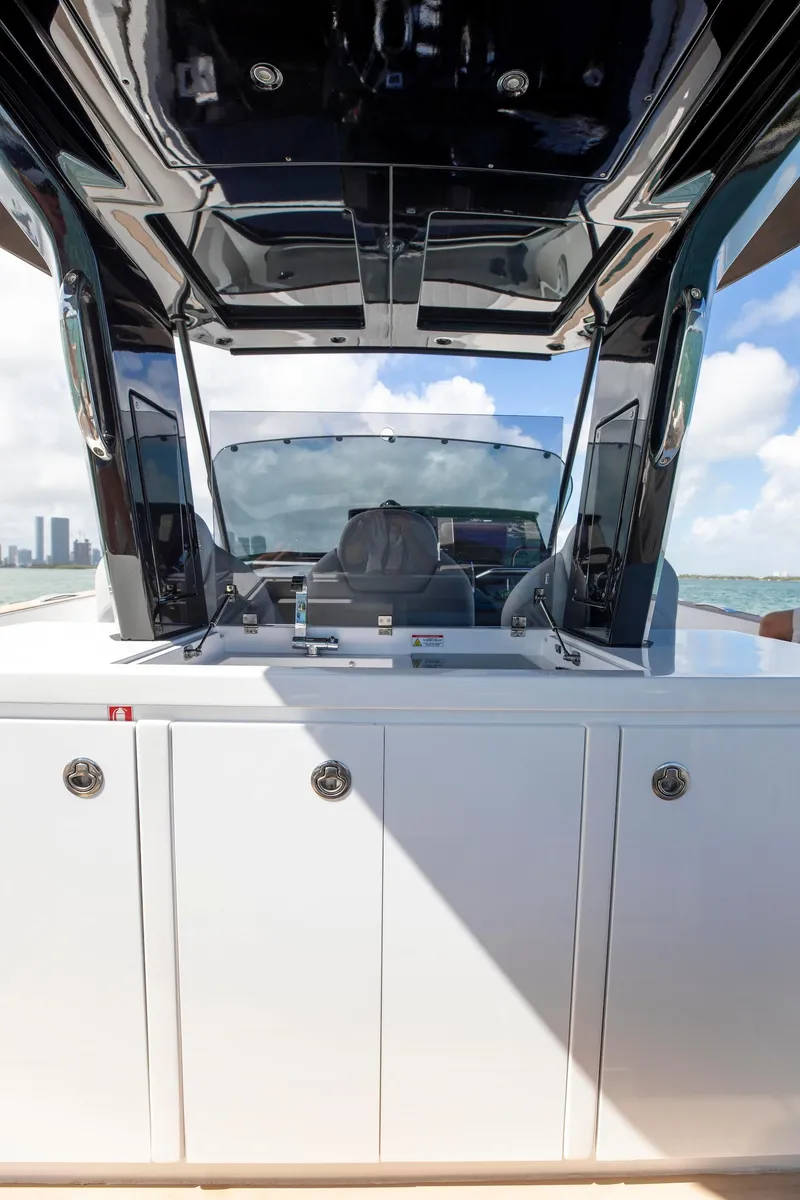 Slide: The Image of 2022 Pardo Yachts 38, sleek design, open deck, modern helm, ocean backdrop. - 47