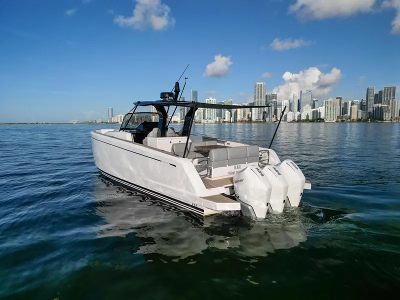 Slide: The Image of 2022 Pardo Yachts 38 cruising near city skyline on a sunny day. - 14
