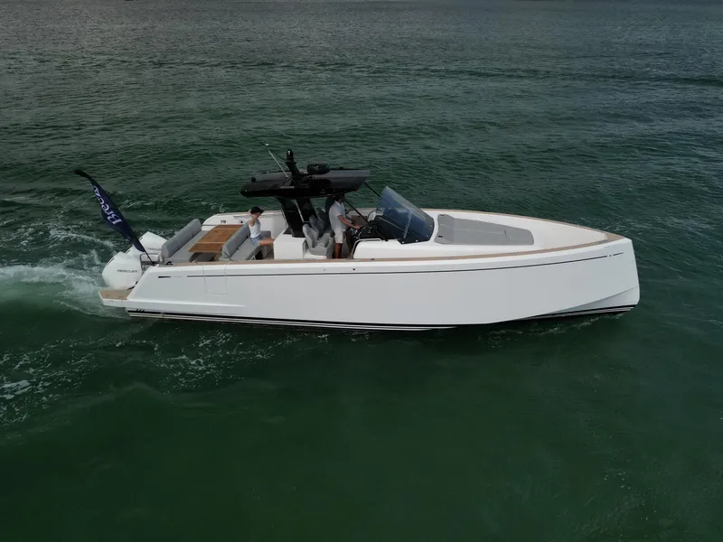 Slide: The Image of 2022 Pardo Yachts 38 cruising on open water, sleek design, luxury motorboat. - 36