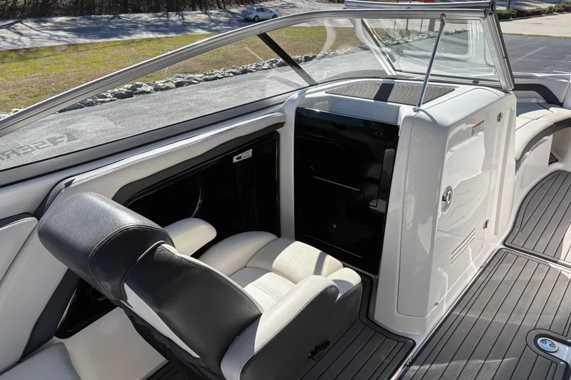 Slide: The Image of 2017 Yamaha 242 Limited SE-Series boat interior with sleek seating and modern design. - 13