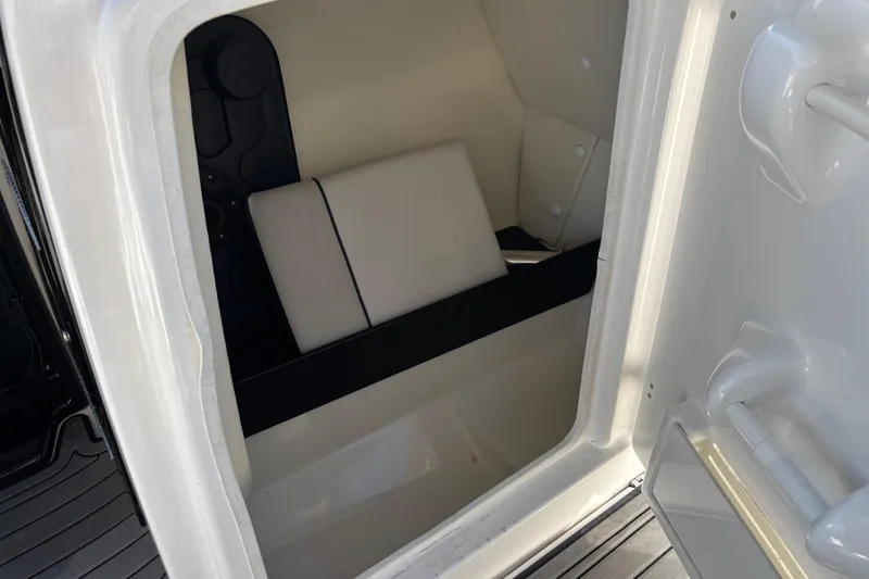Slide: The Image of 2017 Yamaha 242 Limited SE-Series boat storage compartment interior. - 14