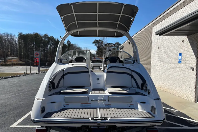 Slide: The Image of 2017 Yamaha 242 Limited SE-Series boat, rear view, parked outdoors on a sunny day. - 4