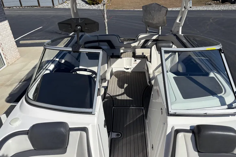 Slide: The Image of 2017 Yamaha 242 Limited SE-Series boat interior with sleek seating and modern design. - 7