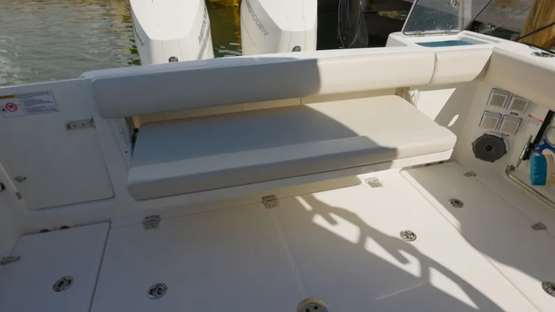 Slide: The Image of Seating area of 2023 Boston Whaler 325 Conquest with engines. - 13