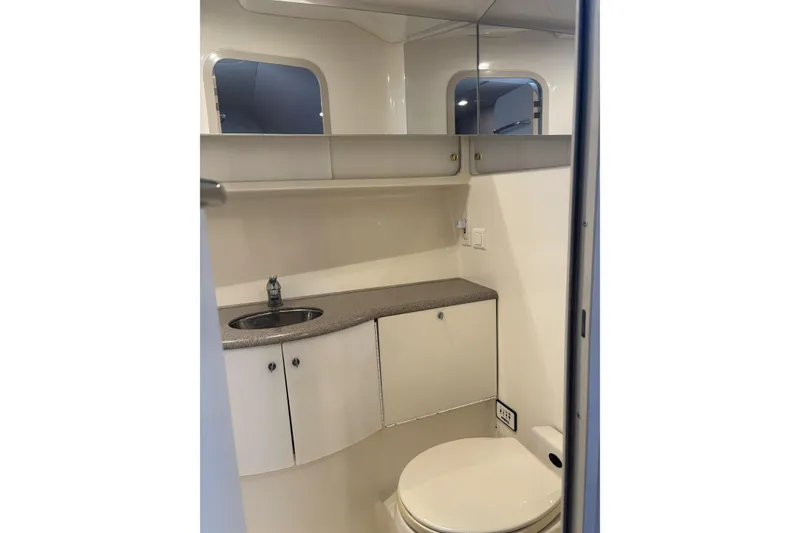 Slide: The Image of 2001 Formula 37 Performance Cruiser bathroom with sink, mirror, and toilet. - 9