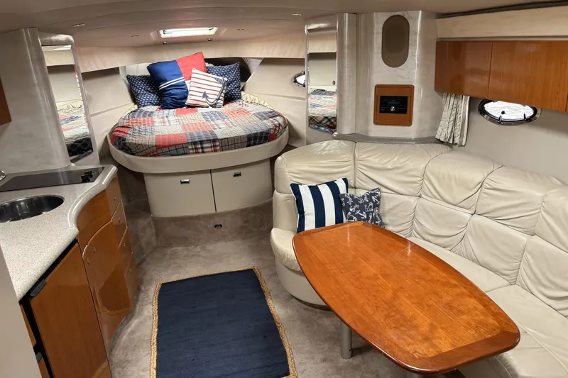 Slide: The Image of Interior of 2001 Formula 37 Performance Cruiser with cozy seating and compact kitchen. - 4