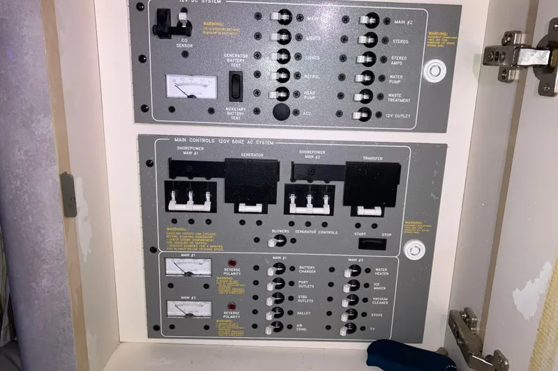 Slide: The Image of Electrical control panel inside a 2001 Formula 37 Performance Cruiser boat. - 32