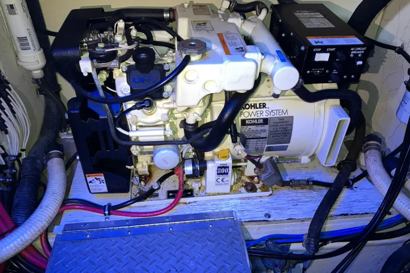 Slide: The Image of Engine compartment of a 2001 Formula 37 Performance Cruiser with Kohler power system. - 53