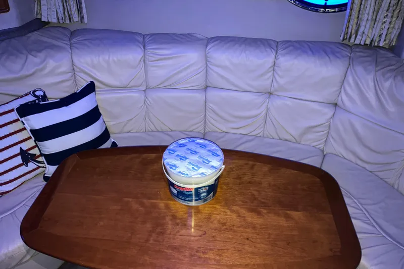 Slide: The Image of Interior of 2001 Formula 37 Performance Cruiser with leather seating and wooden table. - 30