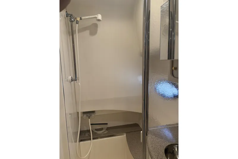 Slide: The Image of 2001 Formula 37 Performance Cruiser bathroom with shower and sink. - 10