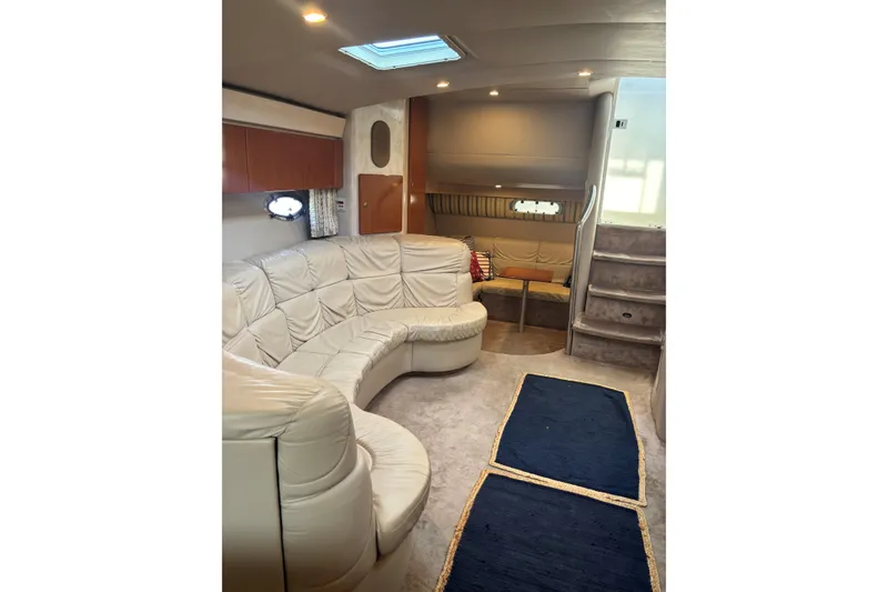 Slide: The Image of Interior of 2001 Formula 37 Performance Cruiser with plush seating and modern design. - 7