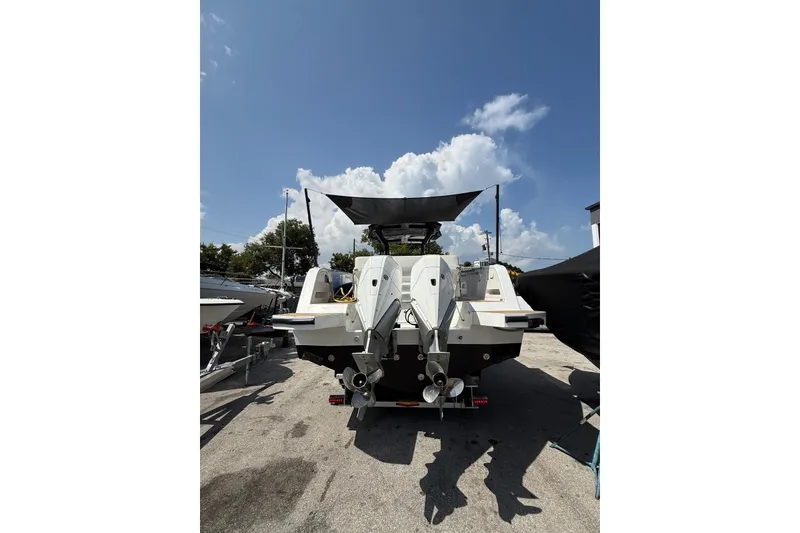 Slide: The Image of 2022 Pardo Yachts 38, rear view, docked under clear blue sky. - 29