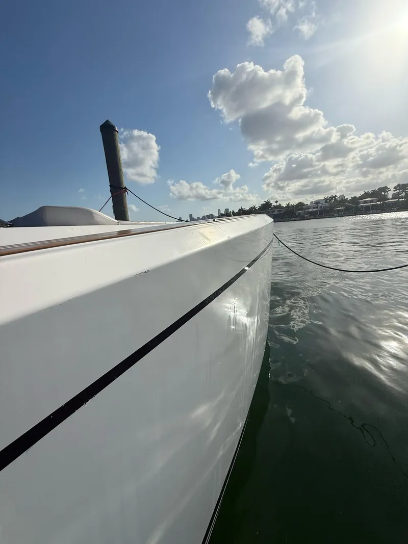 Slide: The Image of 2022 Pardo Yachts 38 on calm water under a sunny sky. - 13