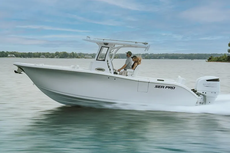 The Image of Manufacturer Provided Image: 2026 Sea Pro 265FLX Sandbar boat cruising on a serene lake. - 0