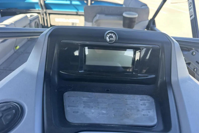 Slide: The Image of 2022 Sea-Doo Switch Sport 21 dashboard with BRP logo and display panel. - 10
