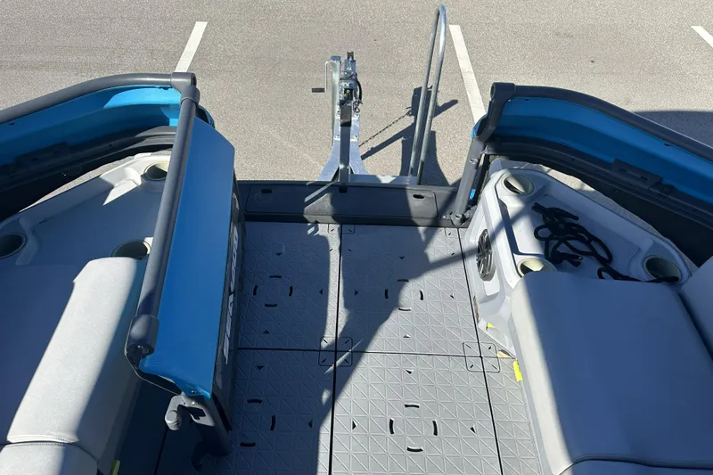 Slide: The Image of 2022 Sea-Doo Switch Sport 21 interior with seating and storage compartments. - 17