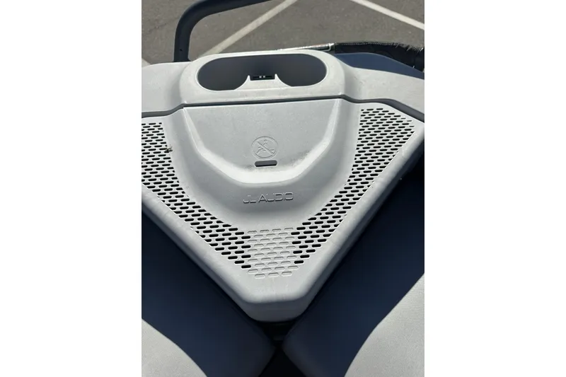 Slide: The Image of 2022 Sea-Doo Switch Sport 21 dashboard with JL Audio speaker grille. - 22