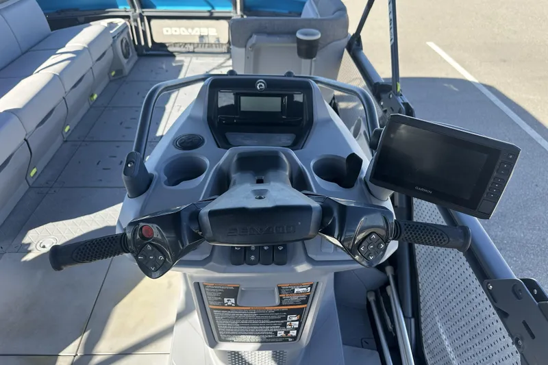 Slide: The Image of 2022 Sea-Doo Switch Sport 21 dashboard with controls and navigation screen. - 7