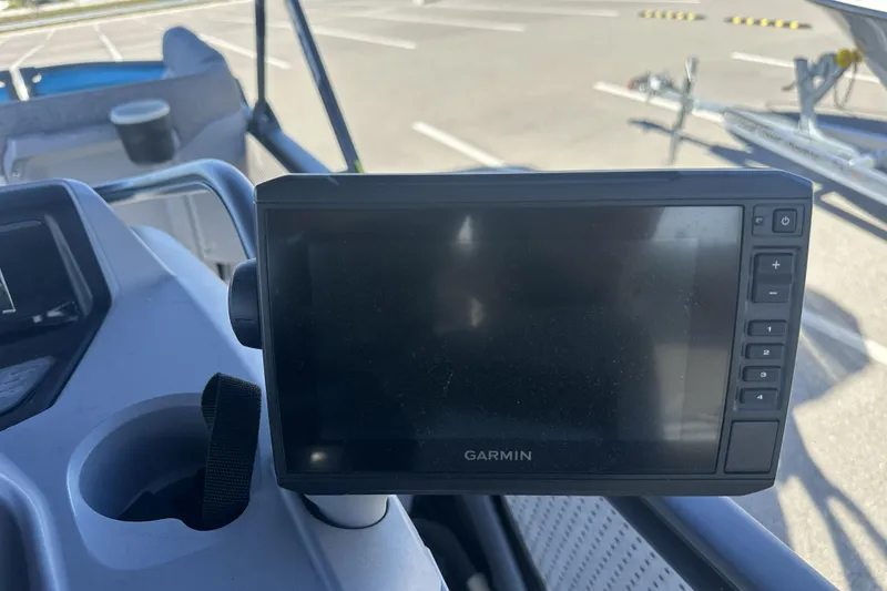 Slide: The Image of Garmin display on 2022 Sea-Doo Switch Sport 21 dashboard in parking lot. - 8