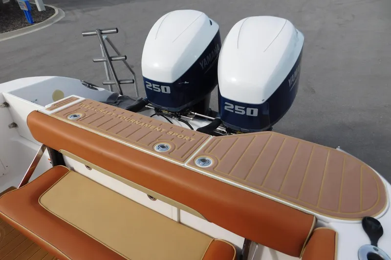 Slide: The Image of 2008 Wellcraft 27 Scarab Tournament boat with twin Yamaha 250 engines, brown seating. - 15