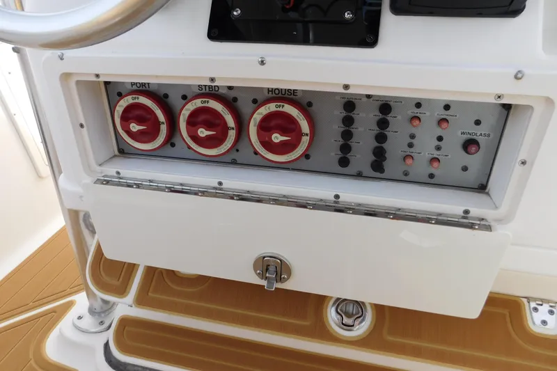 Slide: The Image of Control panel of a 2008 Wellcraft 27 Scarab Tournament boat. - 28