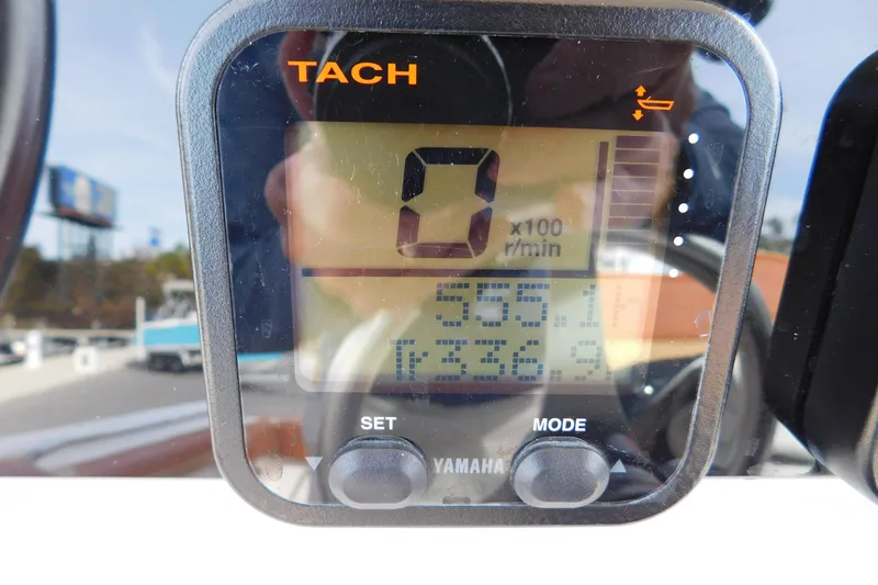 Slide: The Image of Yamaha tachometer on 2008 Wellcraft 27 Scarab Tournament boat, displaying RPM and engine data. - 30