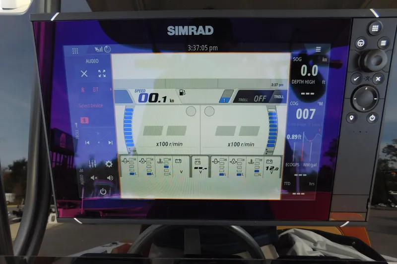 Slide: The Image of Simrad marine display on 2008 Wellcraft 27 Scarab Tournament showing speed and navigation data. - 37