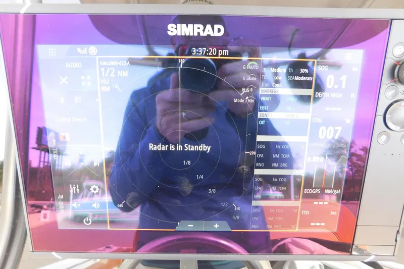Slide: The Image of Simrad marine display on 2008 Wellcraft 27 Scarab Tournament, radar in standby mode. - 38