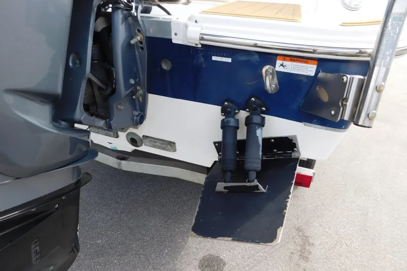 Slide: The Image of Rear view of 2008 Wellcraft 27 Scarab Tournament boat with motor and trim tabs. - 4