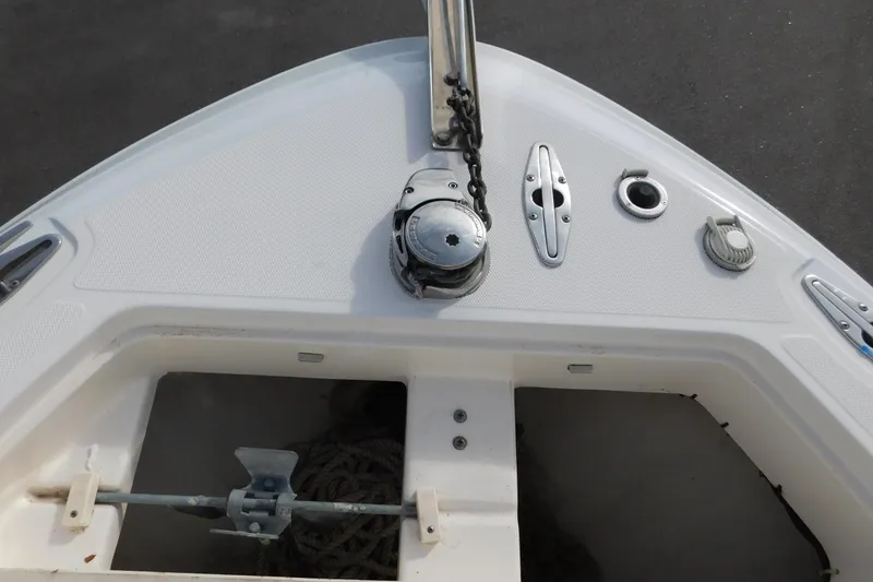 Slide: The Image of Bow of 2008 Wellcraft 27 Scarab Tournament with anchor and chain mechanism. - 45