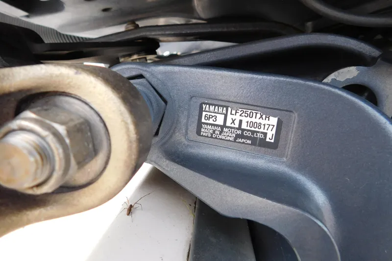Slide: The Image of Close-up of Yamaha LF250TXR engine part on 2008 Wellcraft 27 Scarab Tournament boat. - 5