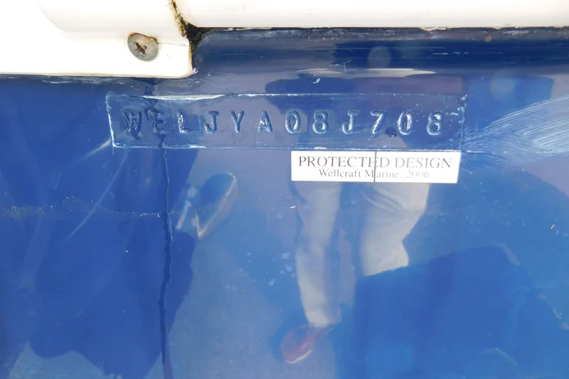 Slide: The Image of 2008 Wellcraft 27 Scarab Tournament hull identification number and protected design label. - 7