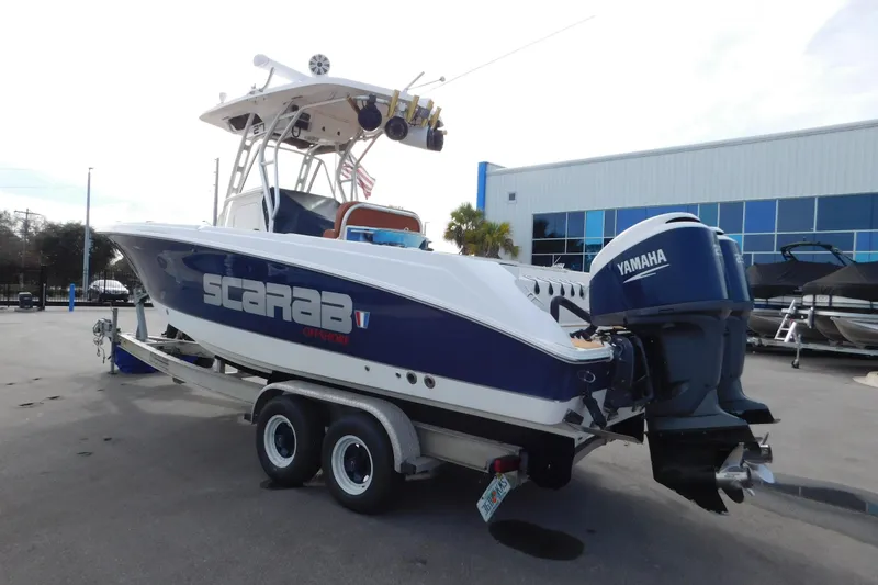 Slide: The Image of 2008 Wellcraft 27 Scarab Tournament boat with Yamaha engine on trailer. - 8