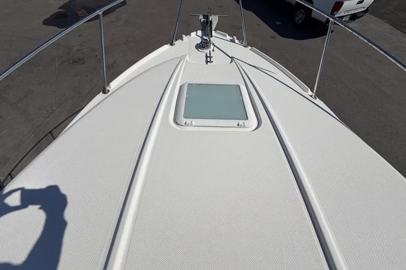 Slide: The Image of 2003 Bayliner 2855 Ciera boat deck with hatch, viewed from above. - 42
