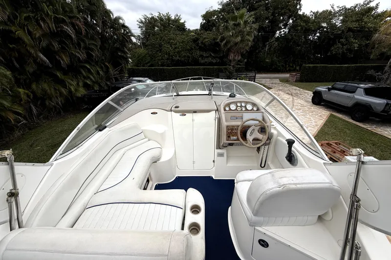 Slide: The Image of 2003 Bayliner 2855 Ciera boat on trailer under clear blue sky. - 8